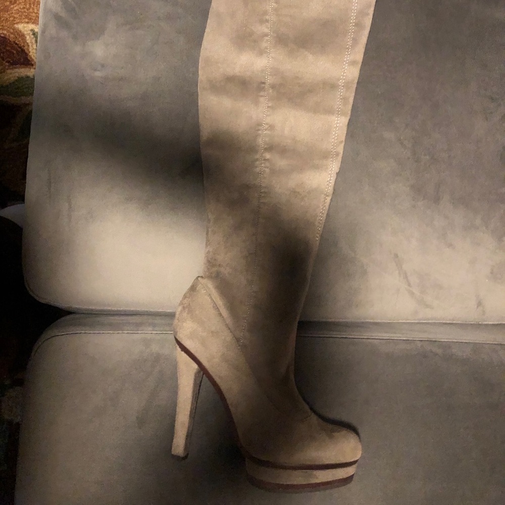 Over the knee high platform boots.